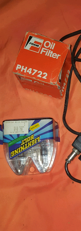 image for  Oil filter and headlight bulbs. 