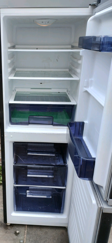 image for BARGAIN TALL BLACK FRIDGE FREEZER FULL WORKING DELIVERY FOR FUEL.