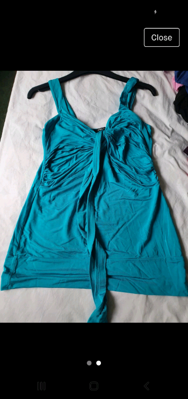 Jane Norman acqa blue top