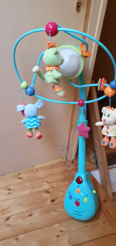 Cot play mobile for babys with light, tunes and rotates