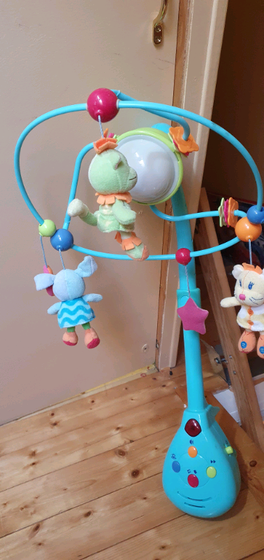 Cot play mobile for babys with light, tunes and rotates