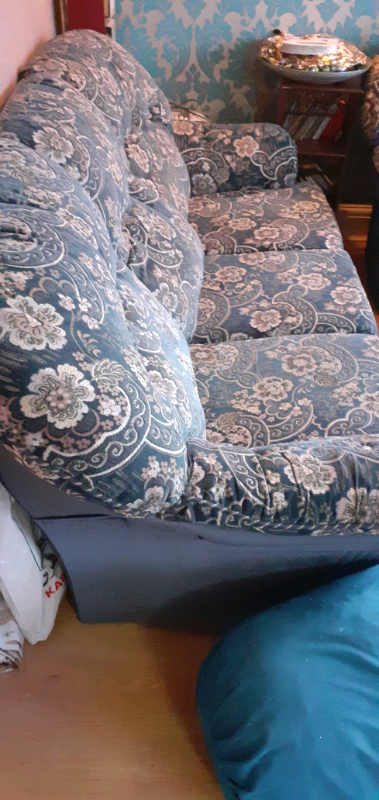 Blue 3 seater velvet sofa with a matching foot stool 