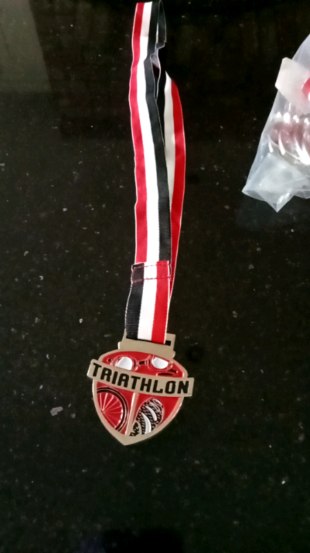 image for 22 triathlon medals 