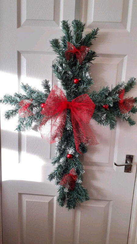 Christmas artificial red cross shaped wreath