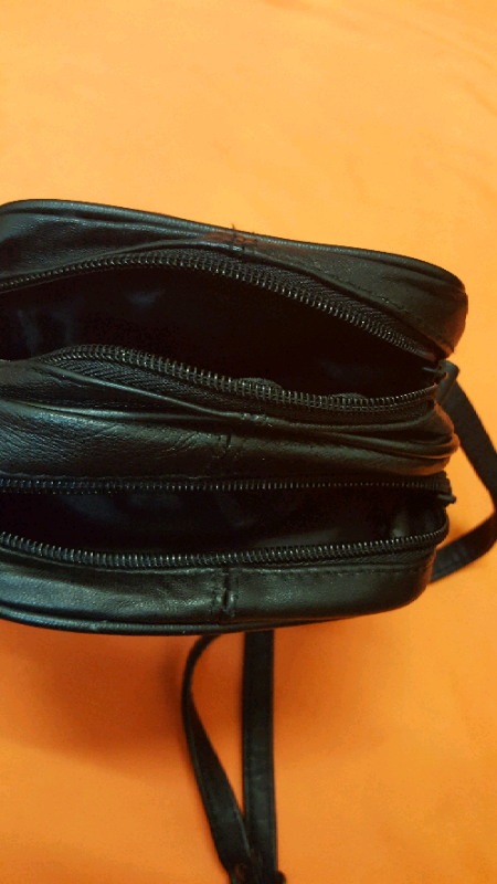 Leather pouch with 7 compartments and adjustable strap BRAND NEW.