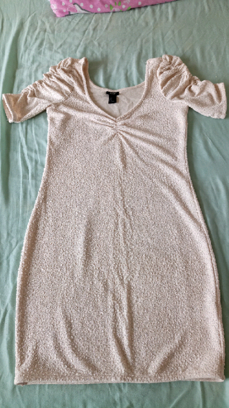 image for Just a ladies creamy, sparkly dress 