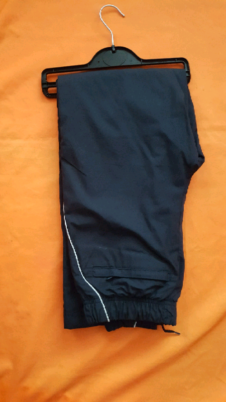 image for Boy's Nike track suit bottoms (as new). Age 8-11 years.