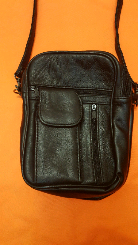 Leather pouch with 7 compartments and adjustable strap BRAND NEW.