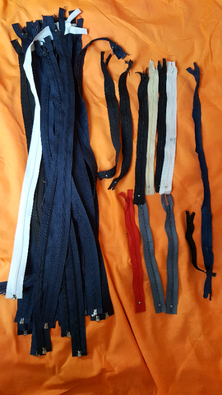 image for A joblot of 36 brand new zips.
