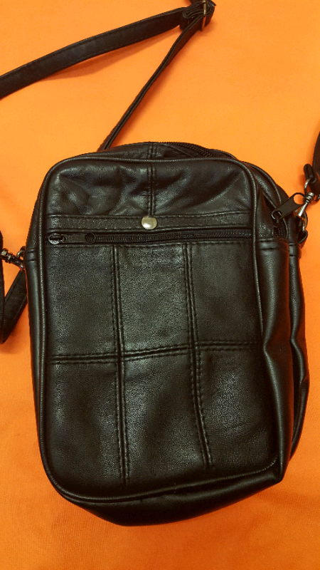 Leather pouch with 7 compartments and adjustable strap BRAND NEW.