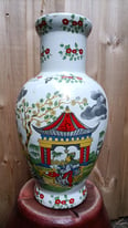 Vintage hand painted ceramic vase, great colors.