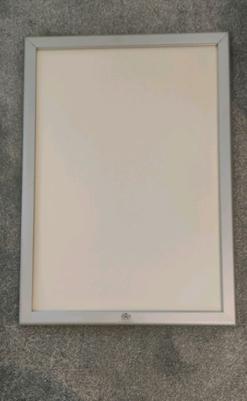 Two snap posters frames.one with brand:Philip morris