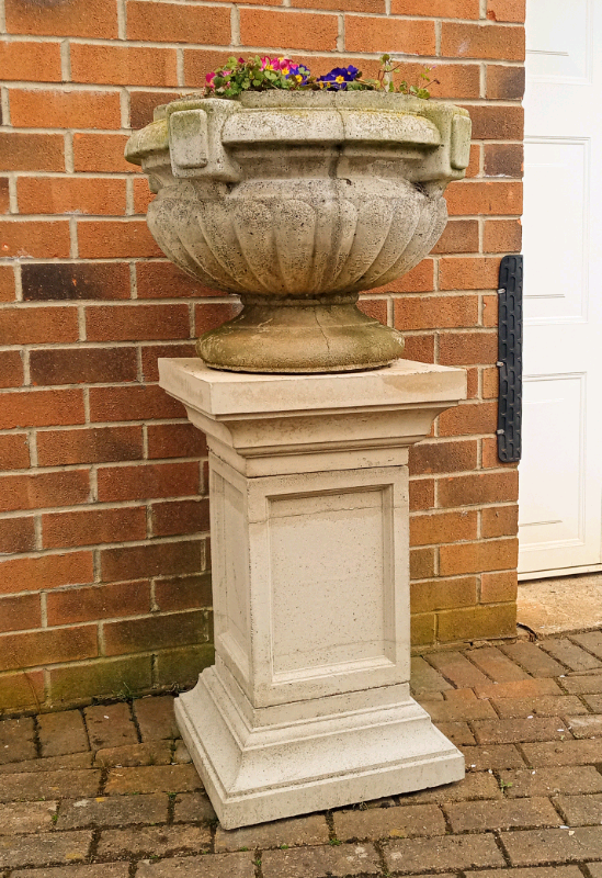 Huge stone urn and plinth base