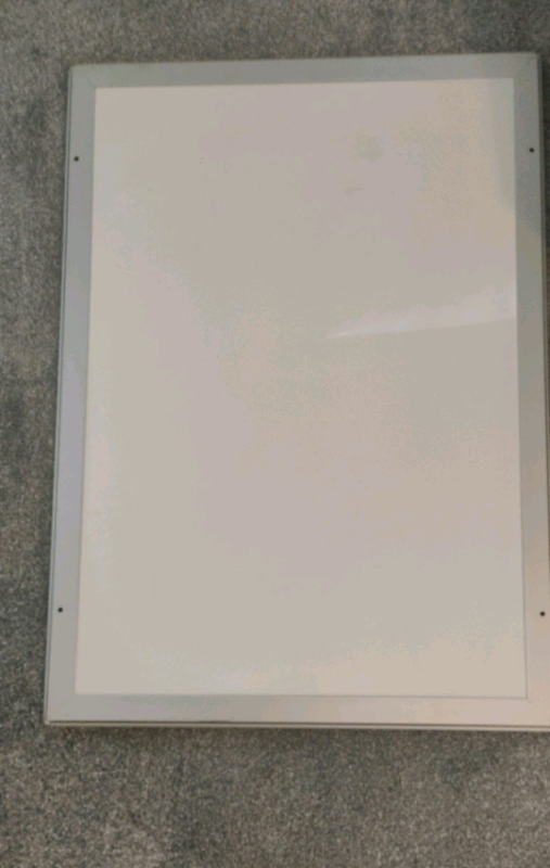 Two snap posters frames.one with brand:Philip morris
