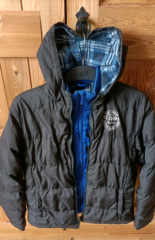 Double zipped coat. Age 13 years. Only £10.00.