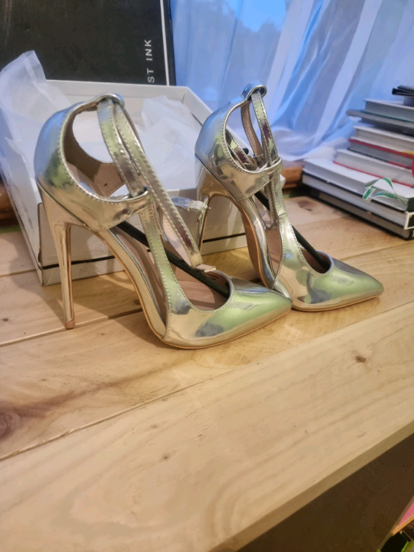 Silver high heels size 4