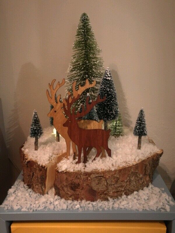 (AVAILABLE) Christmas decoration on a real tree log