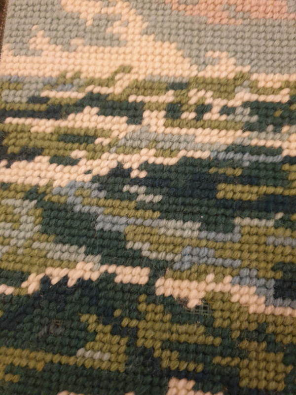 Ship on waves ,crossstitched picture 