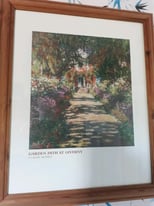 Framed print of Claude Monet 'Garden Path at Giverny'.