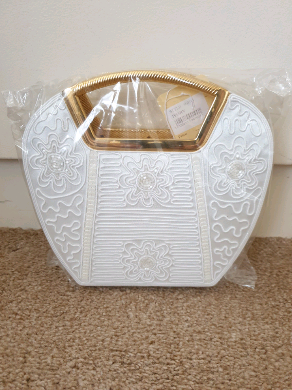 image for Brand new ivory handbag 