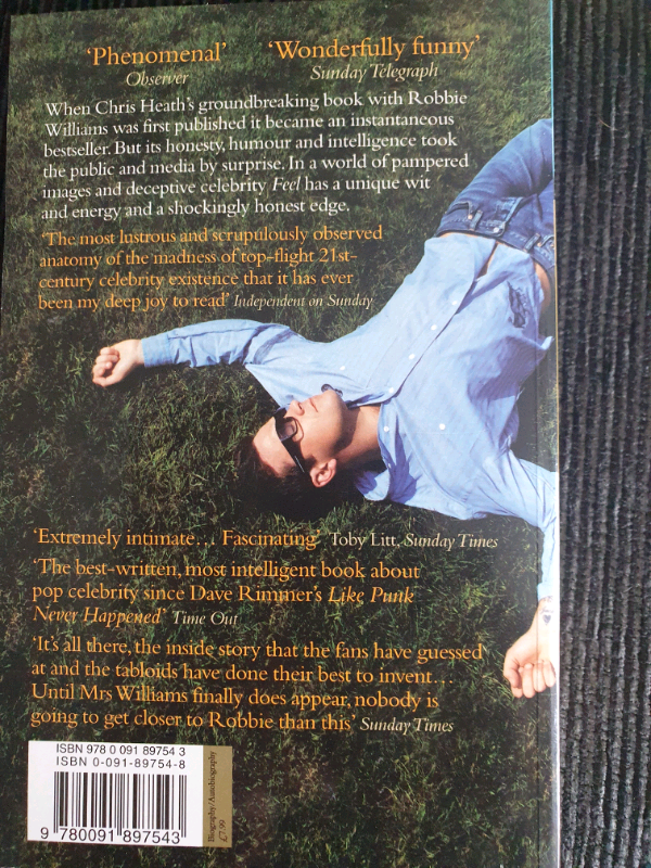 Robbie Williams picture and 2 books
