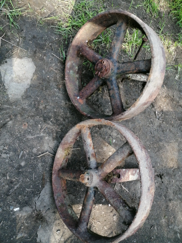 image for Pair of cast iron wheels