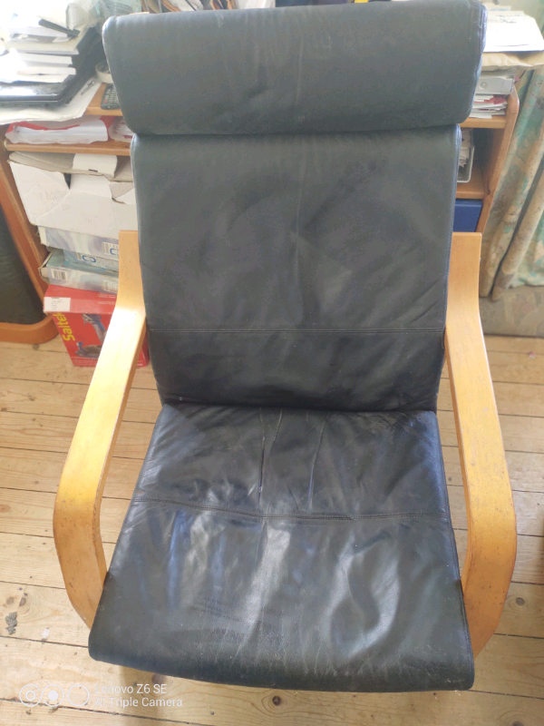 IKEA black armchair and footstool