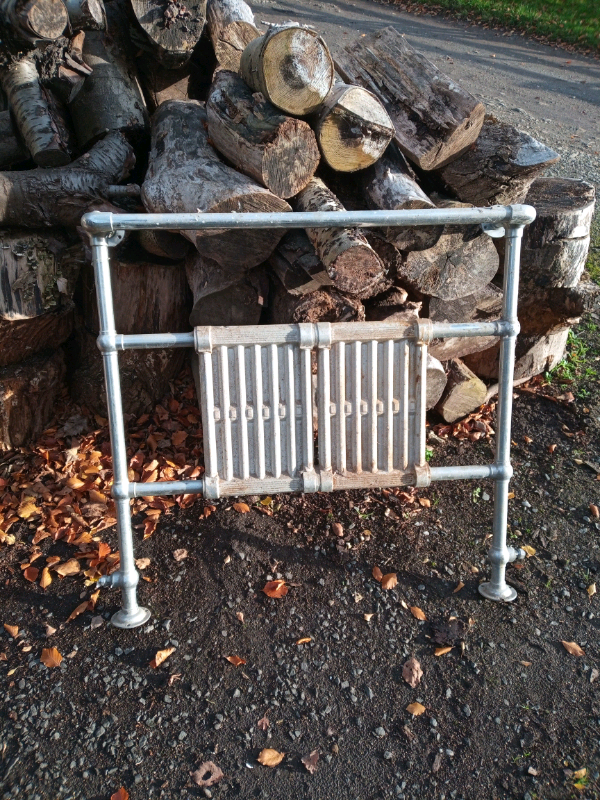 image for Brass and cast iron towel rail.