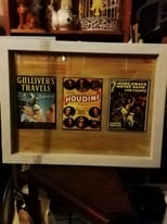 Upcycled solid wooden frame with vintage style metal movie signs 