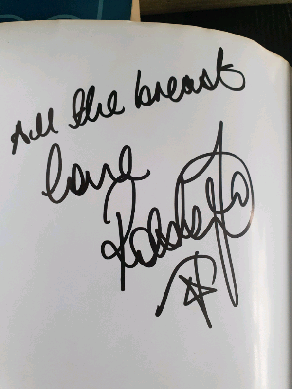 Robbie Williams picture and 2 books