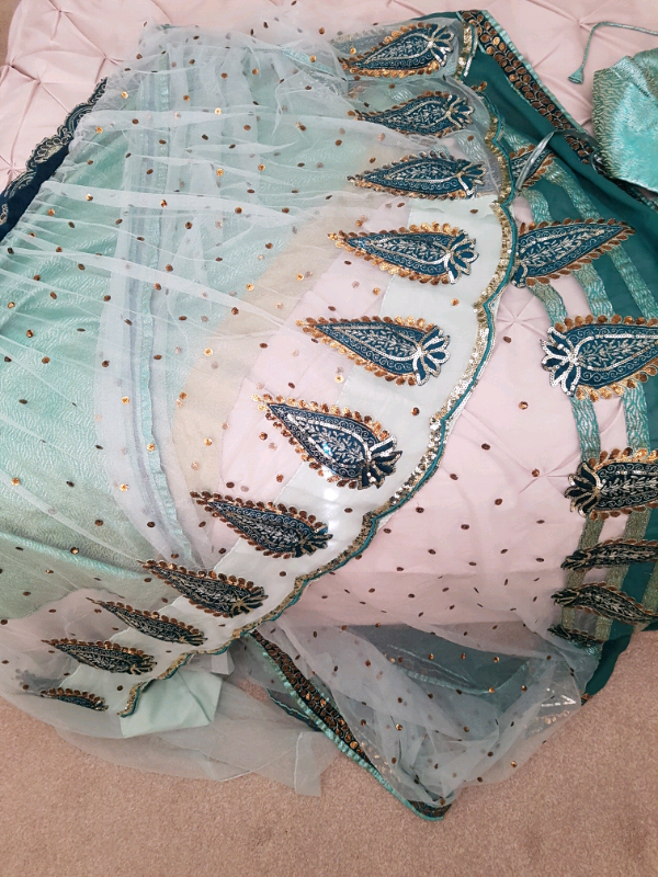 image for Beautiful and elegant brand new Indian netted saree set.