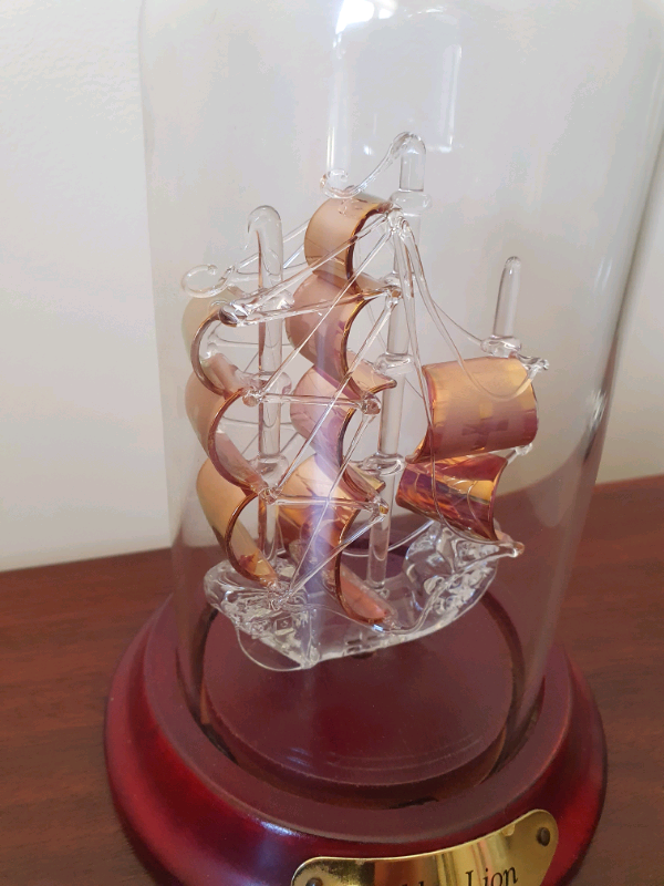 Glass ship in a bottle in ornament 