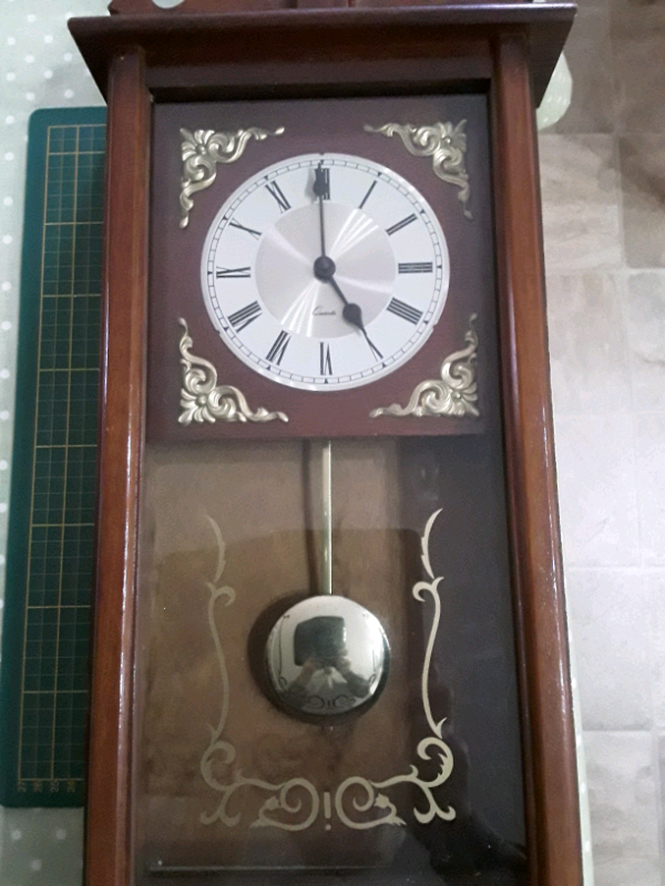DECORATIVE PENDULUM  WALL CLOCK