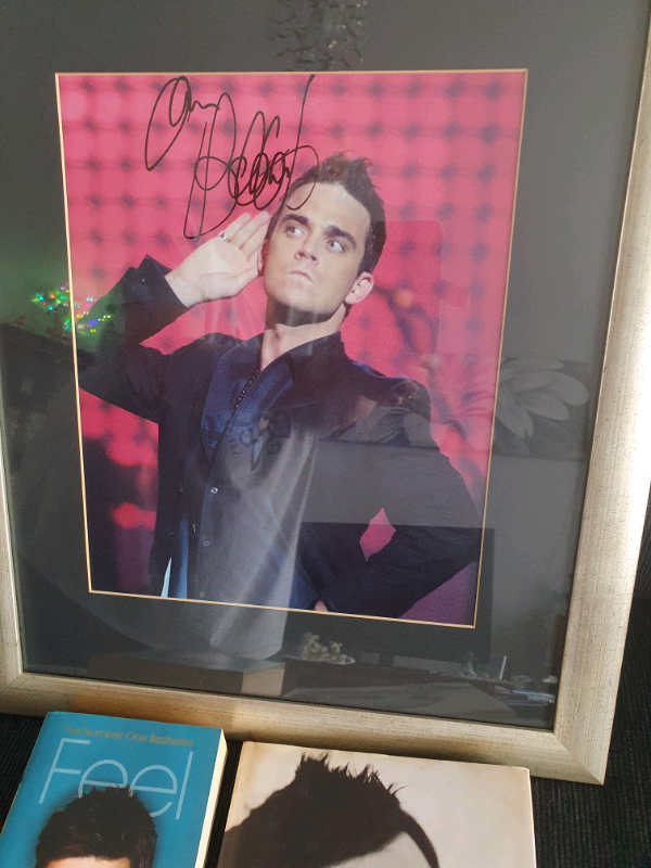 Robbie Williams picture and 2 books