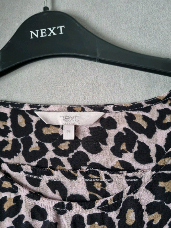 Ladies pale pink leopard print top.
