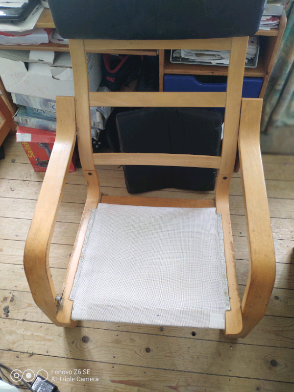 IKEA black armchair and footstool