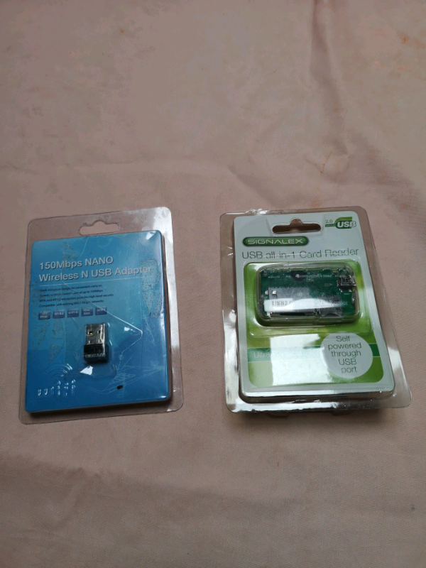 Wireless adapter and usb card reader (both brand new).