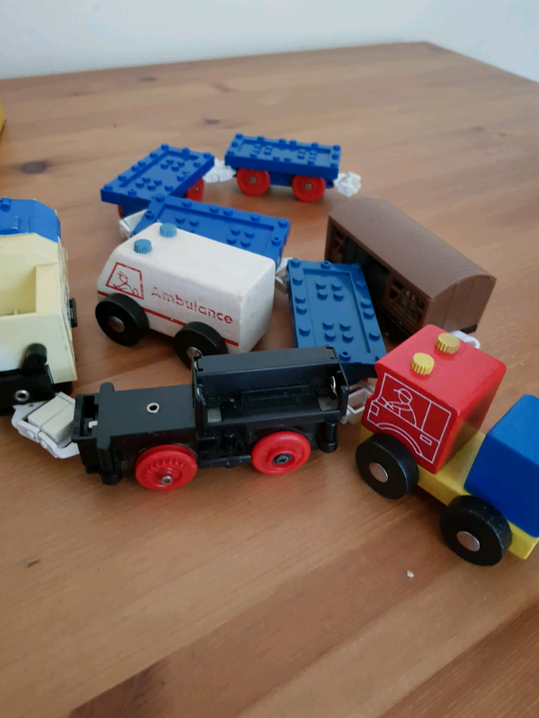 A bagful of railway tracks + locomotive, wagons, etc 