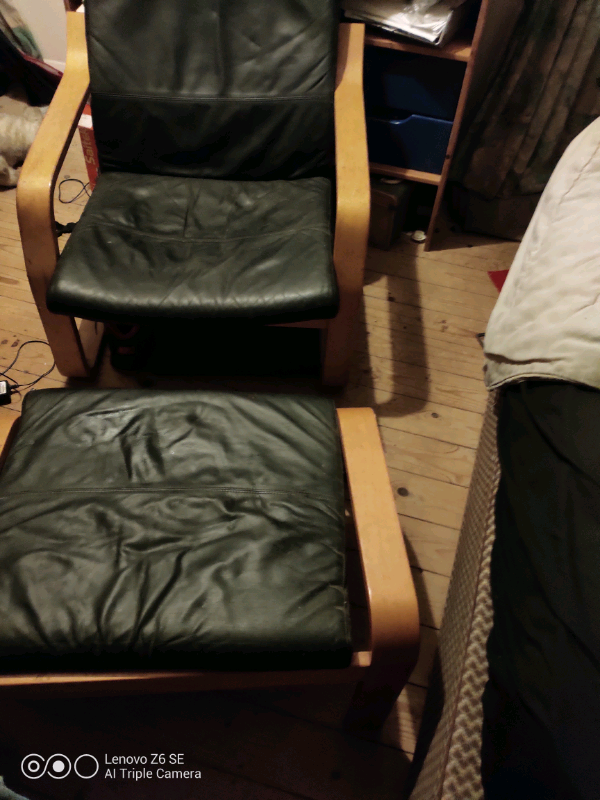 IKEA black armchair and footstool