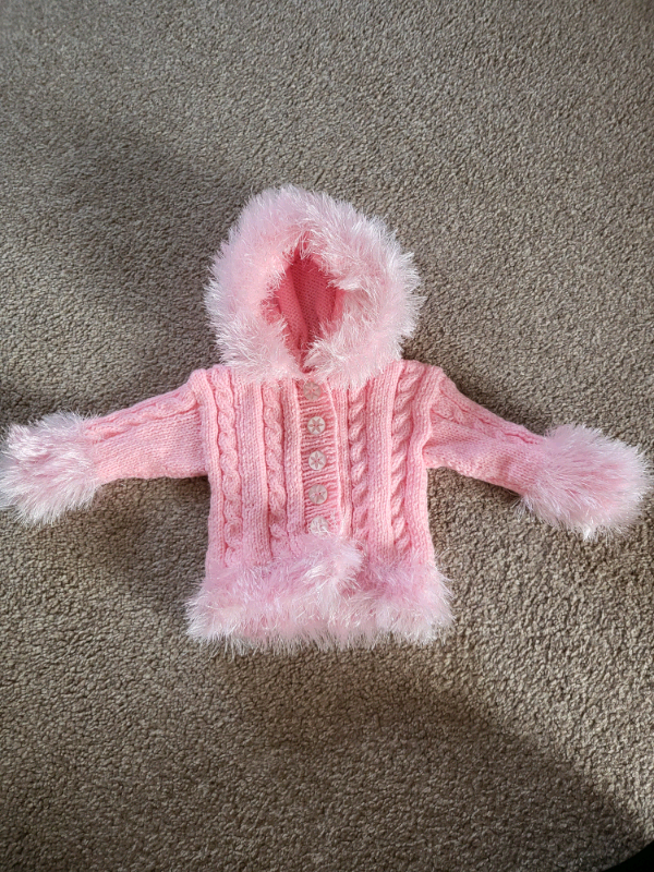 Pink knitted and fluffy jacket. Upto 3 months 