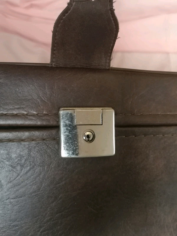Medium size suitcase with wheels in excellent condition