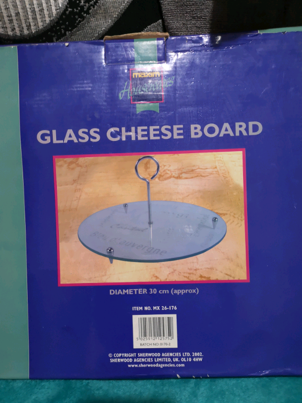 Brand new Glass cheese board.