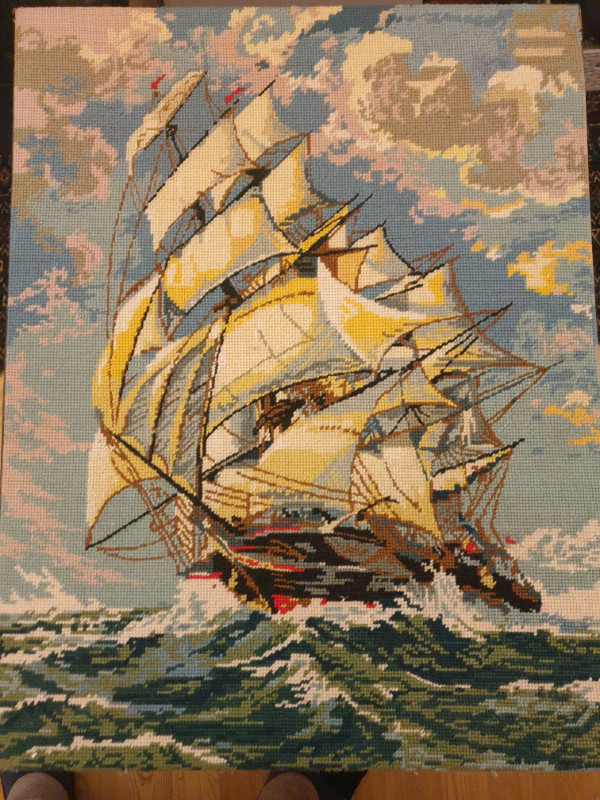 Ship on waves ,crossstitched picture 