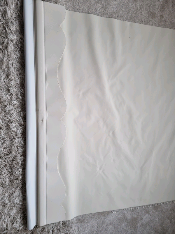 Cream Scalloped Edge Blackout Roller Blind