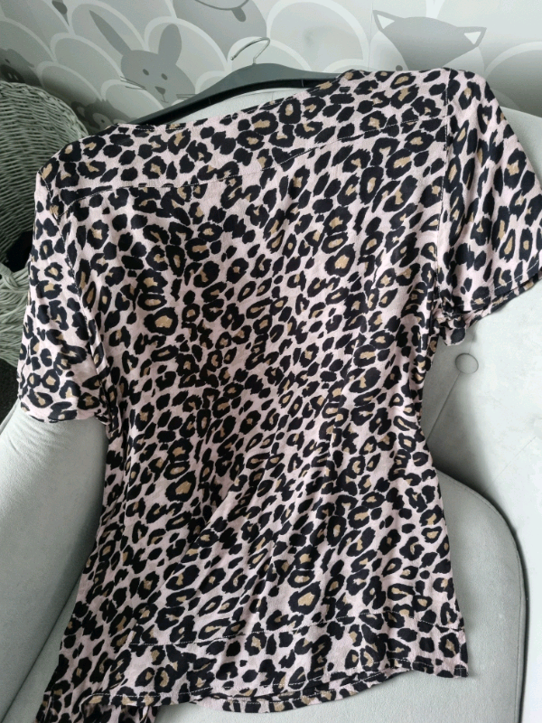 Ladies pale pink leopard print top.