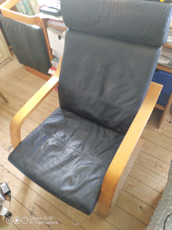 IKEA black armchair and footstool
