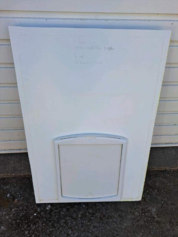 White Petsafe door flap with PVC pannel insert.