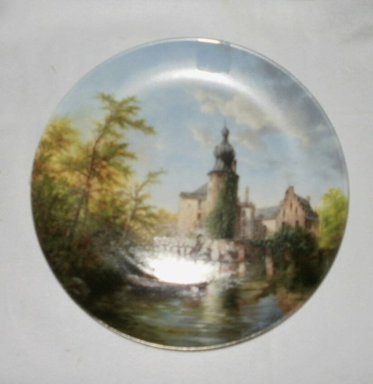 Moated castles by Eleonore  Guinther. Collectors Plates with the artist signature on the plate