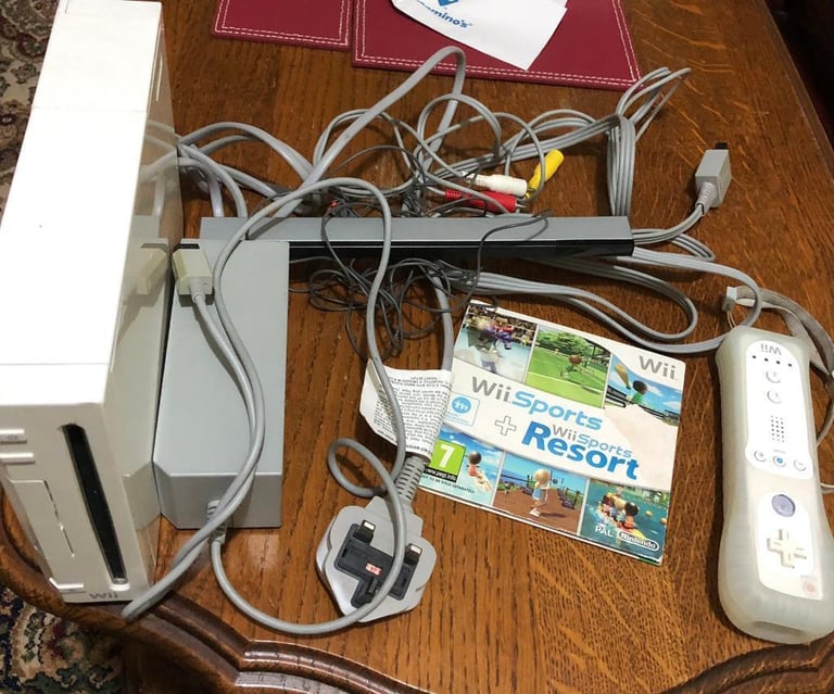 image for Nintendo Wii bundles with 1 sports game ,headphone,balance board,ect