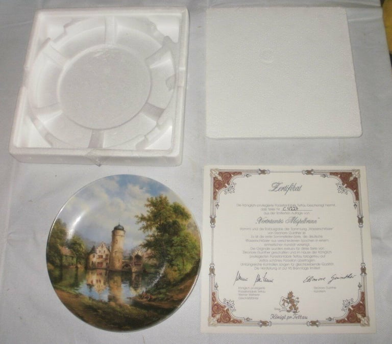 Moated castles by Eleonore  Guinther. Collectors Plates with the artist signature on the plate